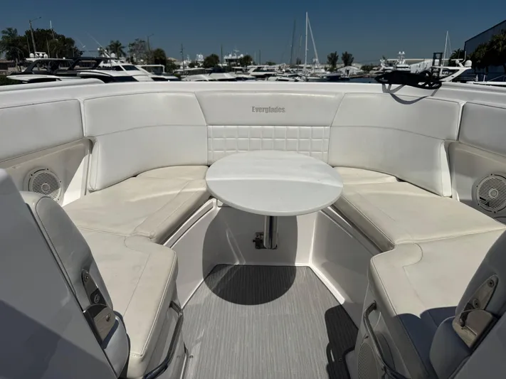  Yacht Photos Pics 2019 Everglades 340 Dual Console boat interior with white seating and table.