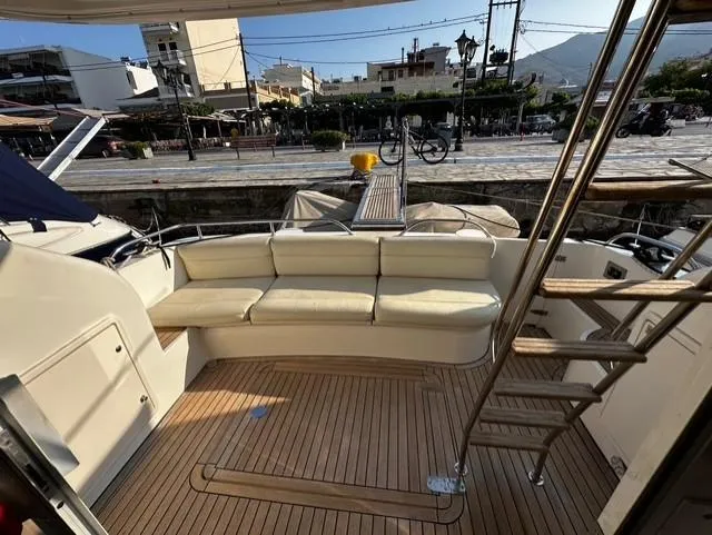  Yacht Photos Pics 1997 Fairline Phantom 37 yacht with spacious deck and comfortable seating.