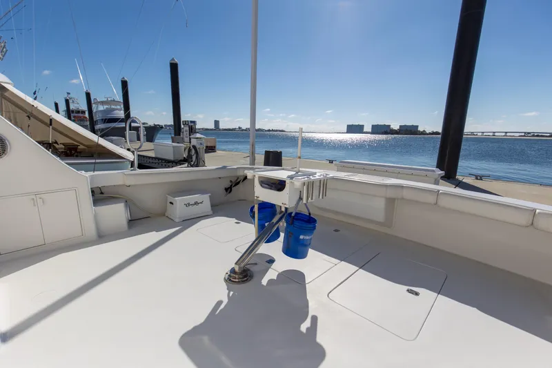  Yacht Photos Pics 1998 Viking 72 Enclosed Bridge yacht deck with ocean view and clear sky.