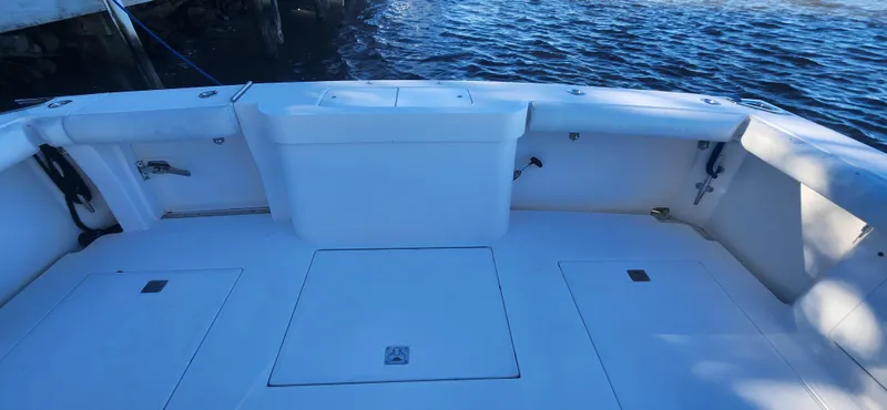 Laura K Yacht Photos Pics 2004 Cabo 48 Convertible boat deck with spacious seating and ocean view.