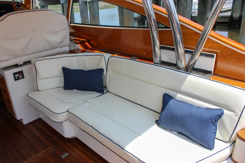 Sunny Daze Yacht Photos Pics Luxurious seating on 2008 Hinckley Talaria 38R Convertible yacht with blue cushions.