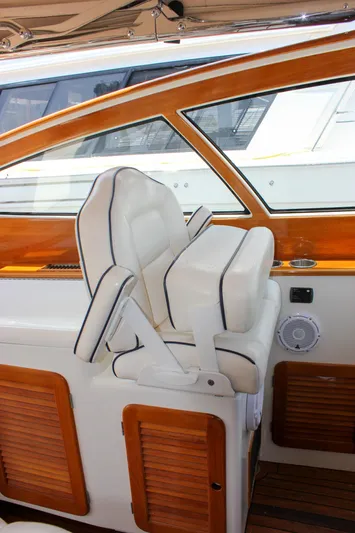 Sunny Daze Yacht Photos Pics Luxury seating on 2008 Hinckley Talaria 38R Convertible yacht with wood accents.