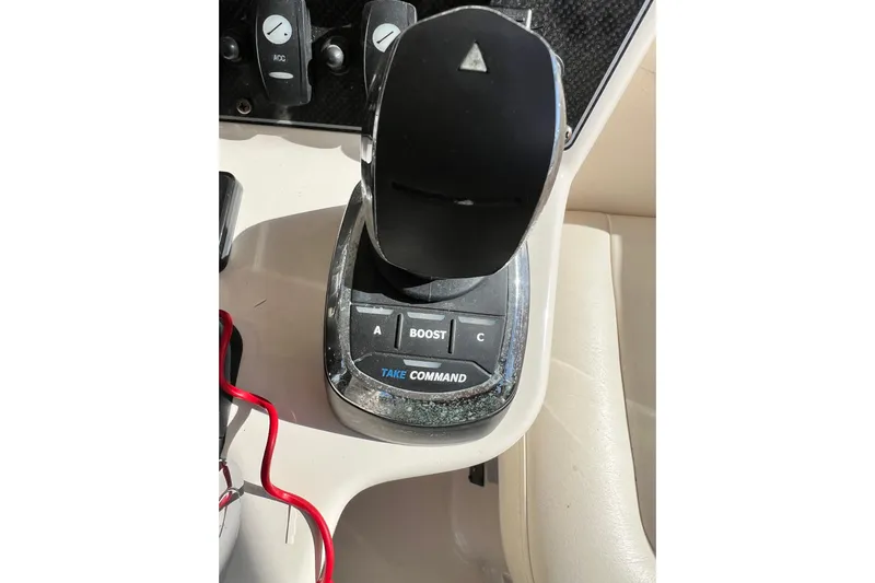 Reel E Blessed Yacht Photos Pics Control panel of a 2017 Grady-White Express 330 boat with joystick and buttons.