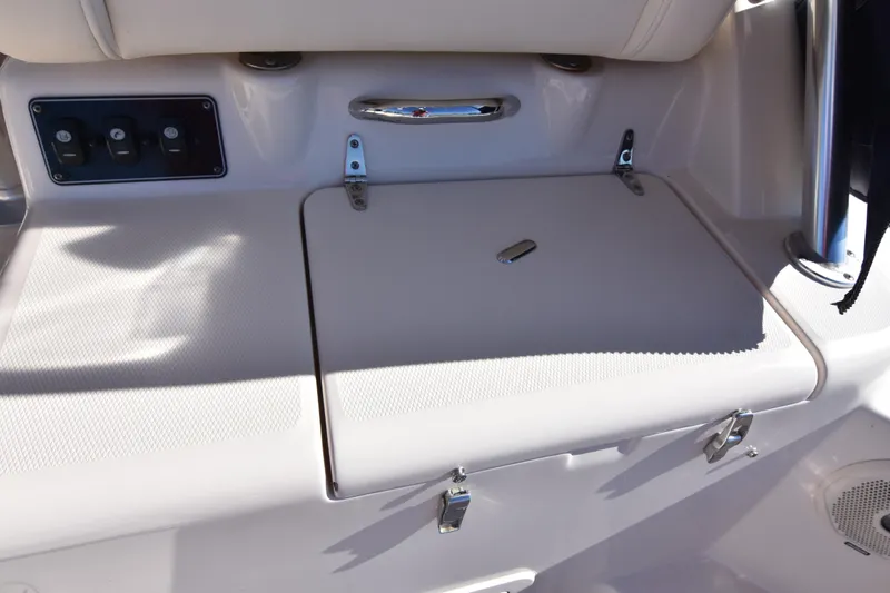 Reel E Blessed Yacht Photos Pics 2017 Grady-White Express 330 boat interior with storage compartment and control panel.