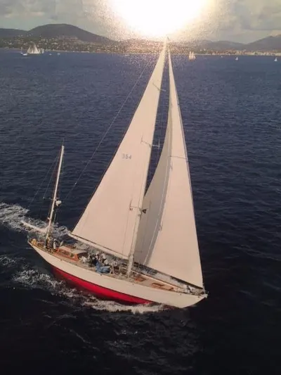 Windigo Yacht Photos Pics 1956 Hinckley S & S Yawl sailing on open sea with scenic background.