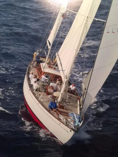 Windigo Yacht Photos Pics 1956 Hinckley S & S Yawl sailing on open sea with full sails.