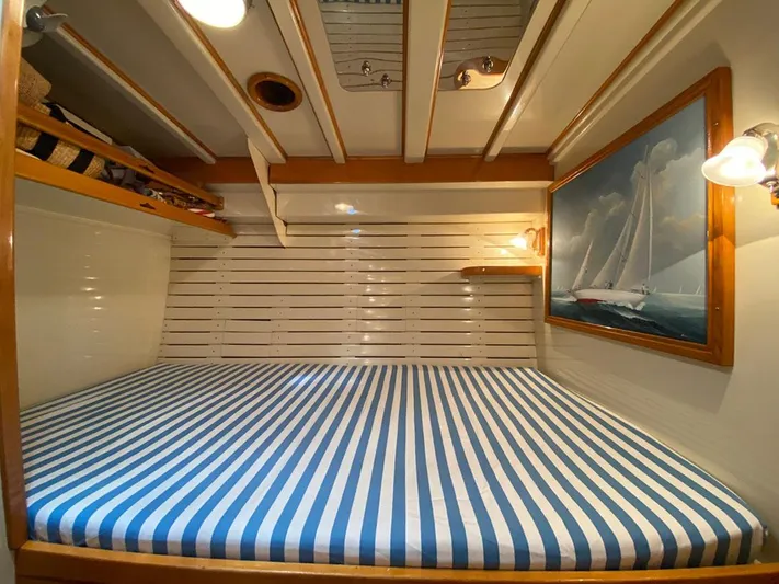 Windigo Yacht Photos Pics 1956 Hinckley S & S Yawl cabin with striped bedding and nautical decor.