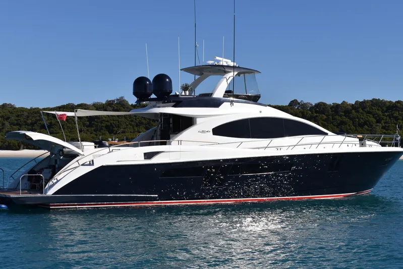 La Mar Yacht Photos Pics Luxury 2012 Lazzara LSX 78 yacht on serene blue water.