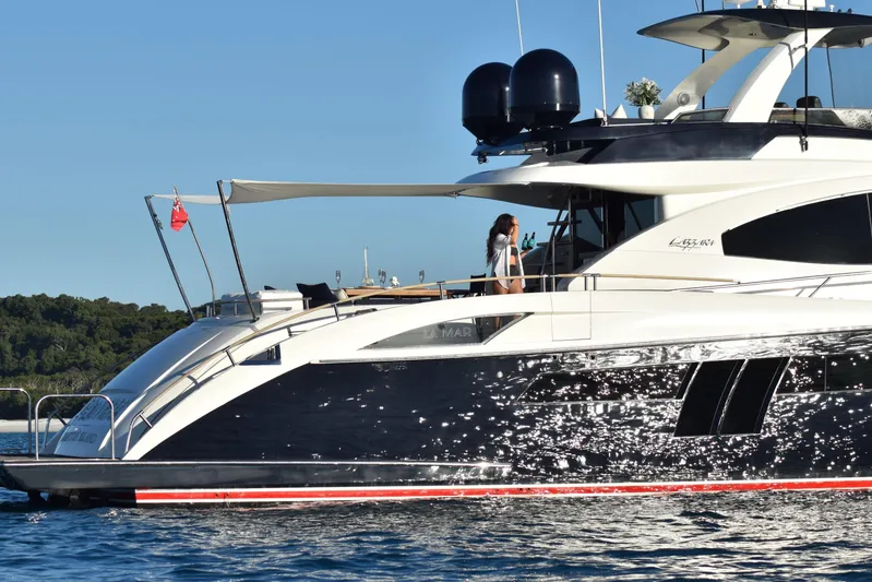 La Mar Yacht Photos Pics Luxury 2012 Lazzara LSX 78 yacht on water, featuring sleek design and modern amenities.