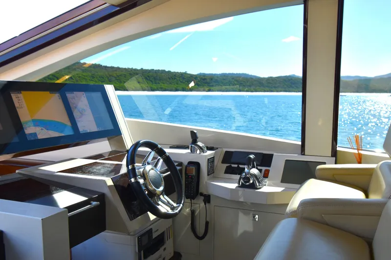 La Mar Yacht Photos Pics Luxurious 2012 Lazzara LSX 78 yacht helm with scenic ocean view.