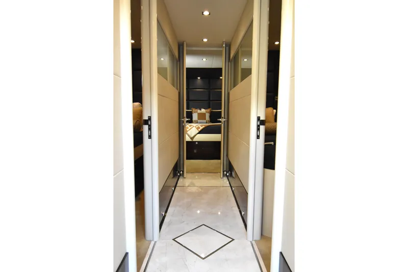 La Mar Yacht Photos Pics Luxurious interior hallway of 2012 Lazzara LSX 78 yacht, featuring elegant design and modern decor.