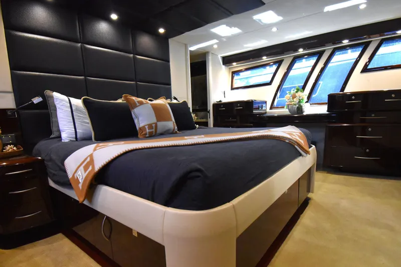 La Mar Yacht Photos Pics Luxurious bedroom interior of 2012 Lazzara LSX 78 yacht with elegant furnishings.