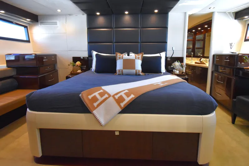 La Mar Yacht Photos Pics Luxurious bedroom interior of 2012 Lazzara LSX 78 yacht with elegant decor.