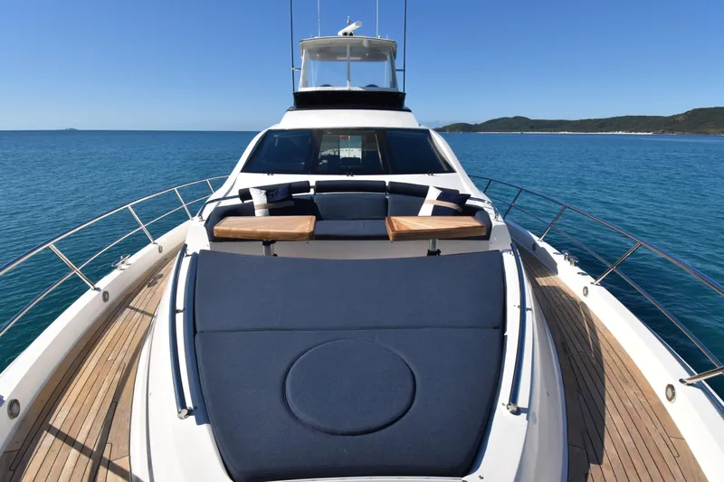 La Mar Yacht Photos Pics Luxurious 2012 Lazzara LSX 78 yacht on serene blue ocean waters.