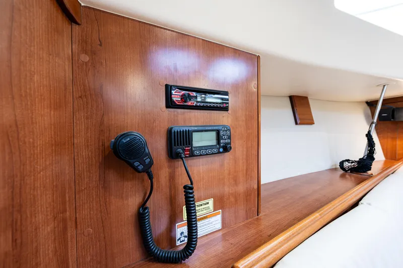  Yacht Photos Pics Interior of 2015 Marlow-Hunter 31 yacht with radio and communication equipment.