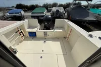 2019 Quicksilver 555 Pilothouse boat interior with storage and equipment.