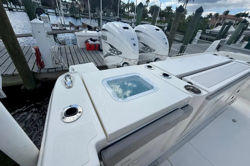  Yacht Photos Pics 2023 Pursuit S 358 Sport boat with Yamaha engines docked at marina.