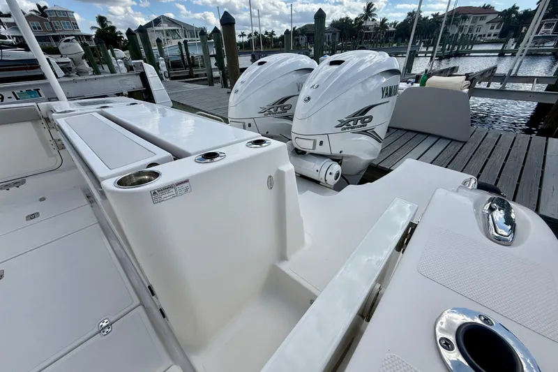  Yacht Photos Pics 2023 Pursuit S 358 Sport boat with Yamaha XTO engines docked at marina.