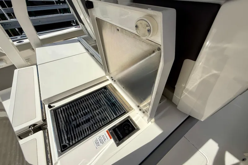  Yacht Photos Pics 2023 Pursuit S 358 Sport boat grill and prep station.