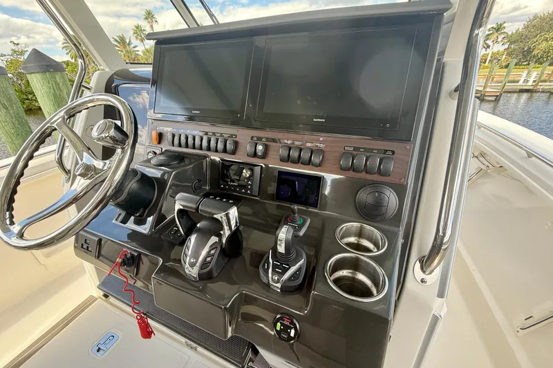  Yacht Photos Pics 2023 Pursuit S 358 Sport helm with dual screens and controls.