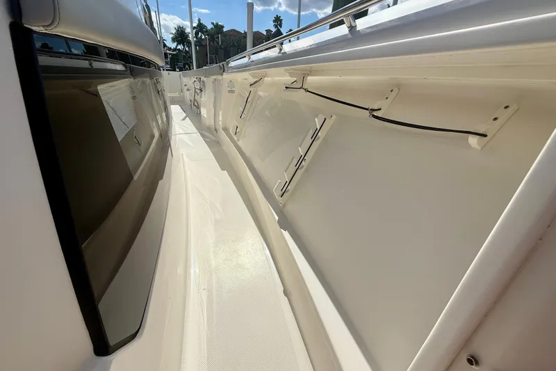  Yacht Photos Pics 2023 Pursuit S 358 Sport boat deck with sleek design and modern features.