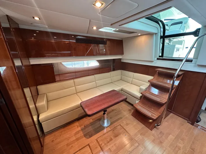 Anke Forever Yacht Photos Pics Luxurious 2010 Sea Ray 470 Sundancer interior with elegant seating and wooden finishes.