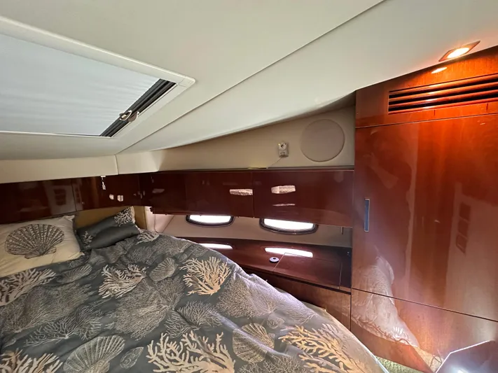 Anke Forever Yacht Photos Pics Luxurious cabin interior of 2010 Sea Ray 470 Sundancer yacht with elegant wood finishes.