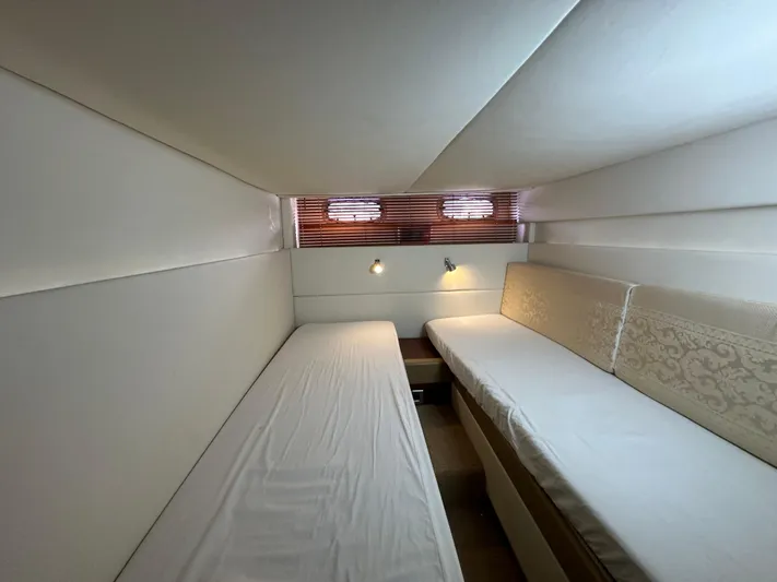 Anke Forever Yacht Photos Pics Interior cabin of 2010 Sea Ray 470 Sundancer with twin beds and modern lighting.