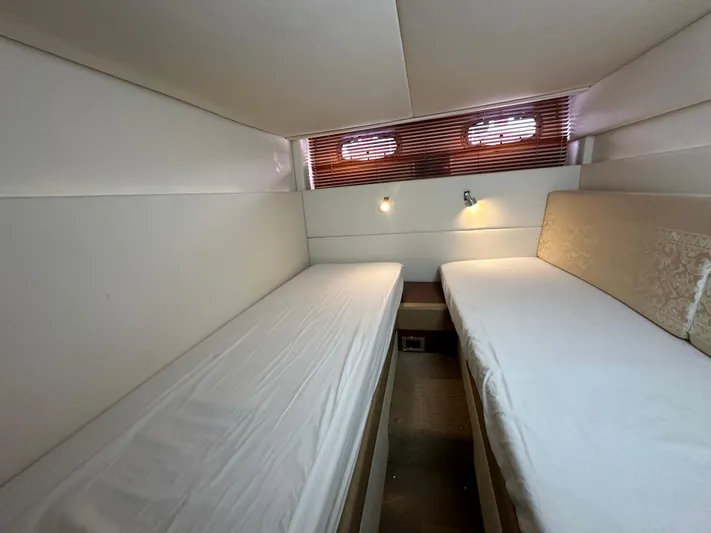 Anke Forever Yacht Photos Pics Interior cabin of 2010 Sea Ray 470 Sundancer with twin beds and modern lighting.