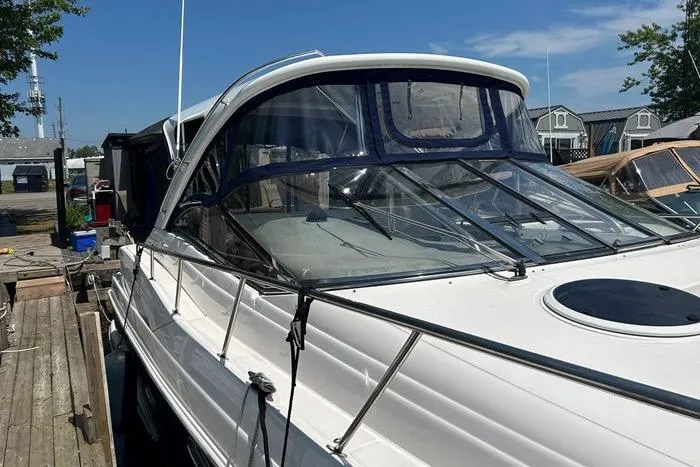 Knot On Call Yacht Photos Pics 2007 Regal Commodore 4060 yacht docked at marina under clear blue sky.