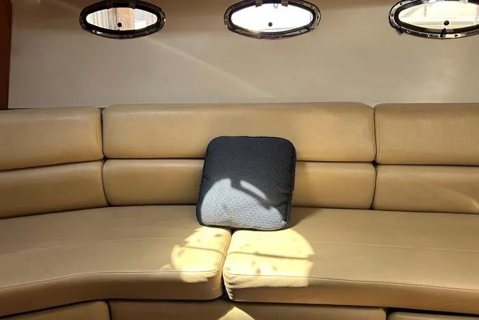 Knot On Call Yacht Photos Pics Luxurious beige leather seating inside a 2007 Regal Commodore 4060 yacht.