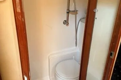 Knot On Call Yacht Photos Pics 2007 Regal Commodore 4060 yacht bathroom with shower and toilet.