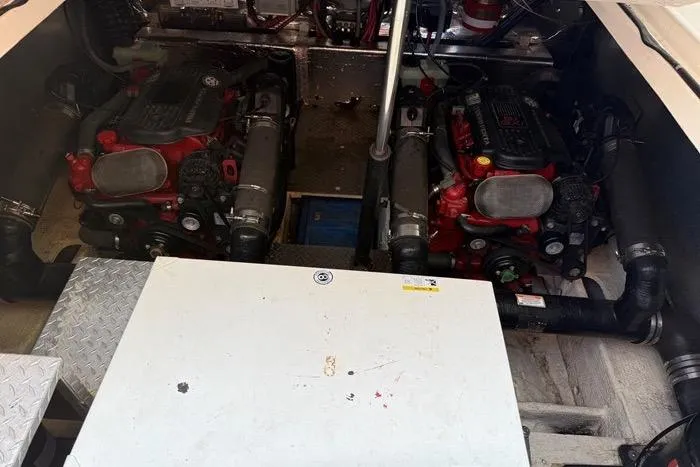 Knot On Call Yacht Photos Pics Engine compartment of a 2007 Regal Commodore 4060 boat with dual engines.