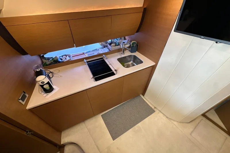  Yacht Photos Pics Modern kitchen area in 2011 Azimut Atlantis 40 yacht with sink and appliances.
