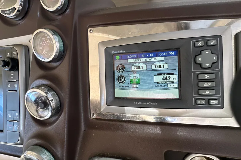  Yacht Photos Pics Control panel of a 2011 Azimut Atlantis 40 yacht displaying vessel status and fuel information.