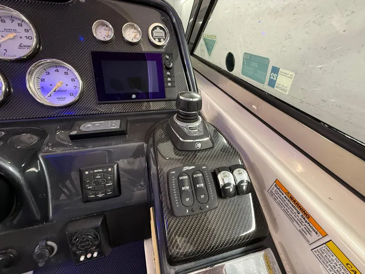  Yacht Photos Pics Control panel of a 2017 Formula 370 FX boat with gauges and joystick.