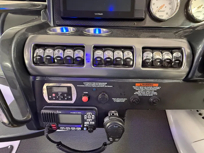  Yacht Photos Pics Control panel of a 2017 Formula 370 FX boat with switches and gauges.