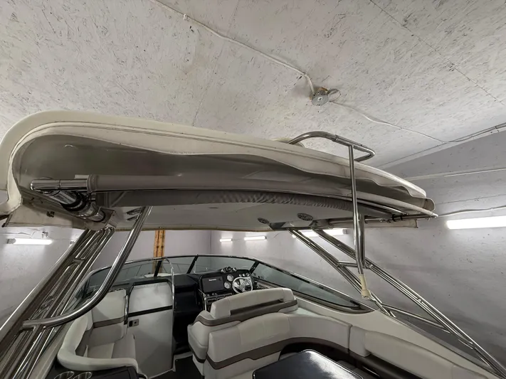  Yacht Photos Pics 2017 Formula 370 FX boat interior with seating and helm, stored indoors.