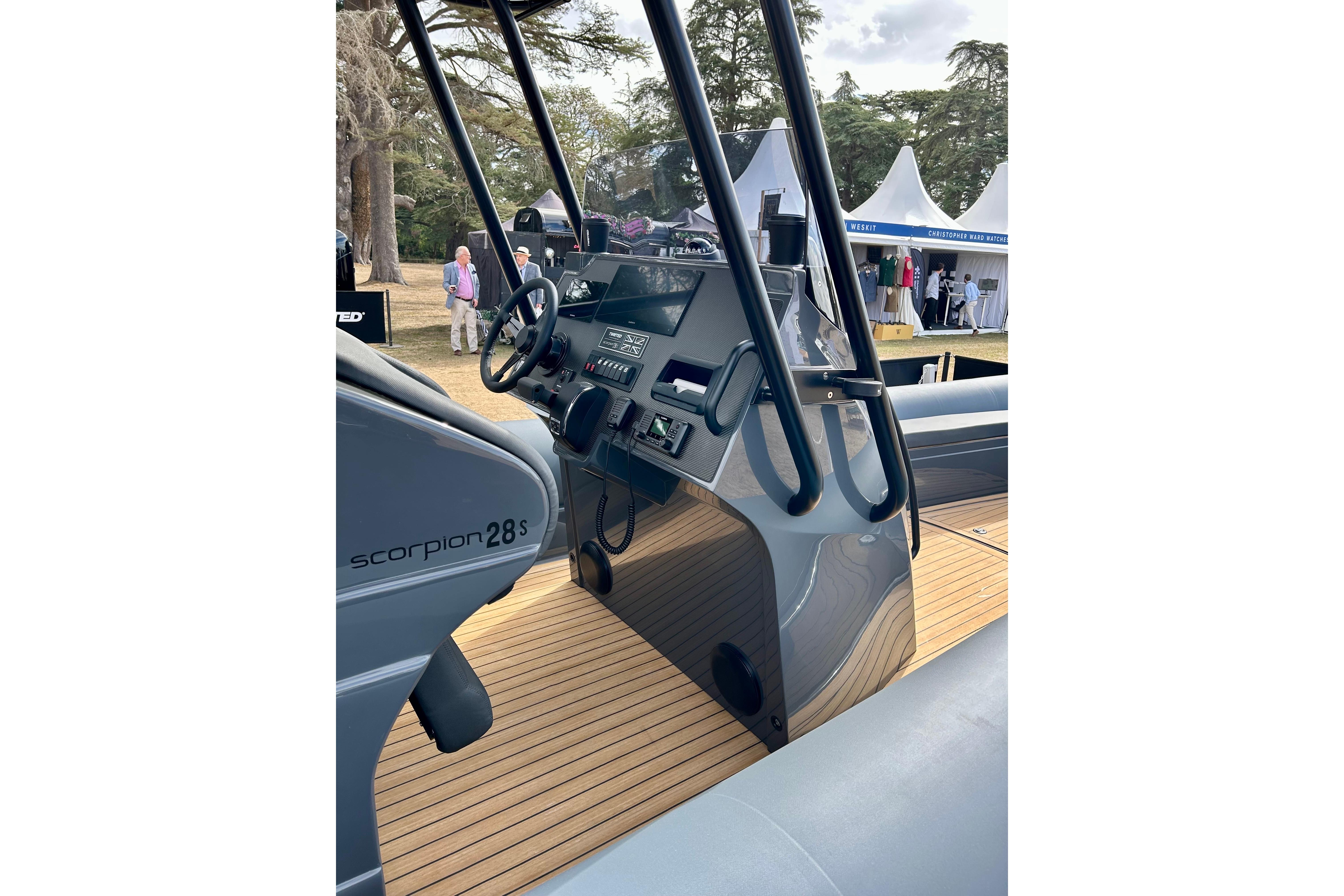 2025 Twisted 28 Sport boat interior with sleek design and modern controls.