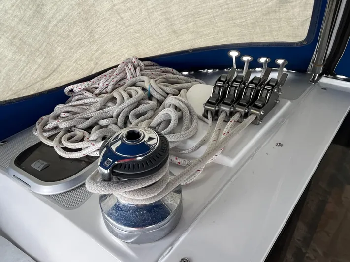 Moonshadow Yacht Photos Pics Sailboat deck with winch, ropes, and levers on a 1998 Catalina 42 MkII.