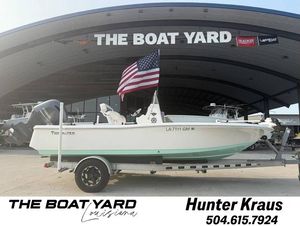 2017 Tidewater 2000 boat on trailer at The Boat Yard, Louisiana, with American flag.