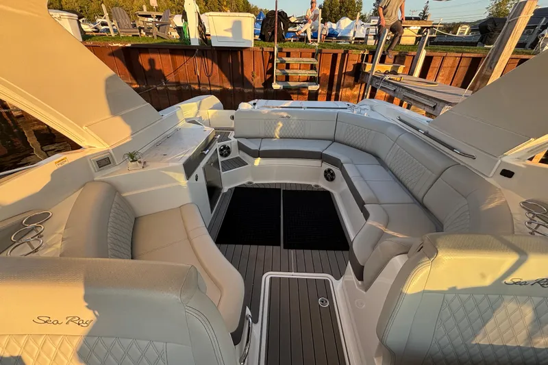  Yacht Photos Pics Luxurious 2022 Searay SLX350 boat interior with elegant seating and modern design.