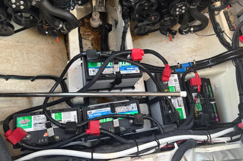  Yacht Photos Pics Engine compartment of 2022 Searay SLX350 with multiple batteries and wiring.
