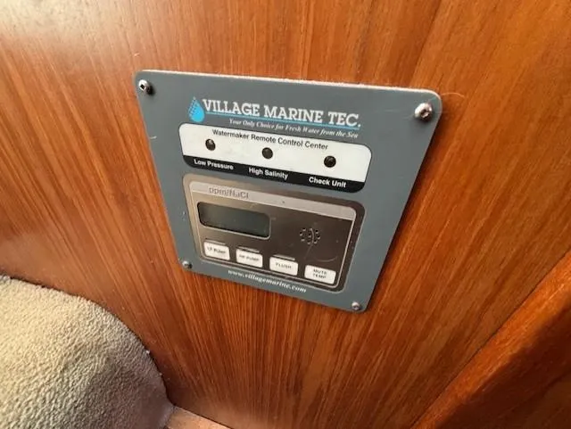 Thunderbolt Yacht Photos Pics 1988 Riviera Convertible watermaker control panel by Village Marine Tec on wooden interior.