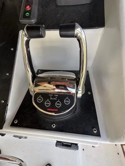 Thunderbolt Yacht Photos Pics Yanmar throttle control on 1988 Riviera Convertible boat dashboard.