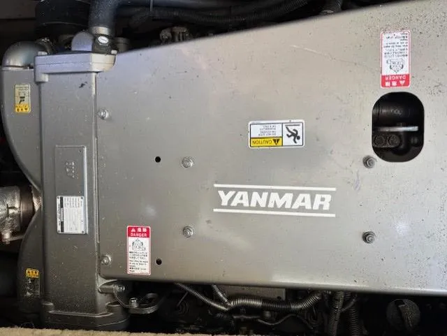 Thunderbolt Yacht Photos Pics Engine compartment of a 1988 Riviera Convertible with Yanmar components.