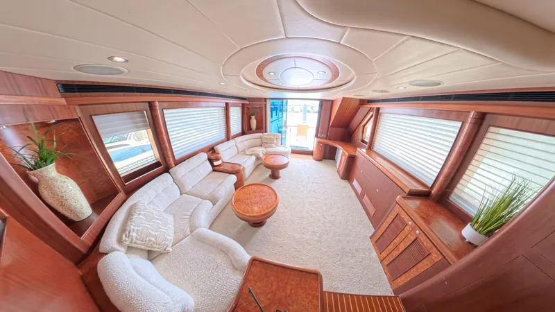 Arlene Yacht Photos Pics Luxurious 2009 Horizon Vision yacht interior with plush seating and elegant wood finishes.