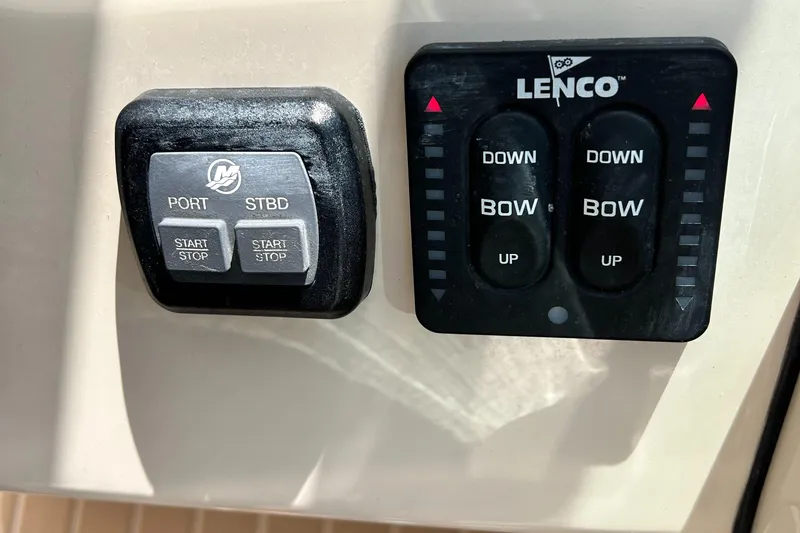  Yacht Photos Pics Control panel of a 2017 Boston Whaler 320 Vantage boat with Lenco trim tabs.