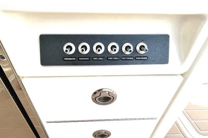  Yacht Photos Pics Control panel on 2017 Boston Whaler 320 Vantage boat, featuring labeled switches.