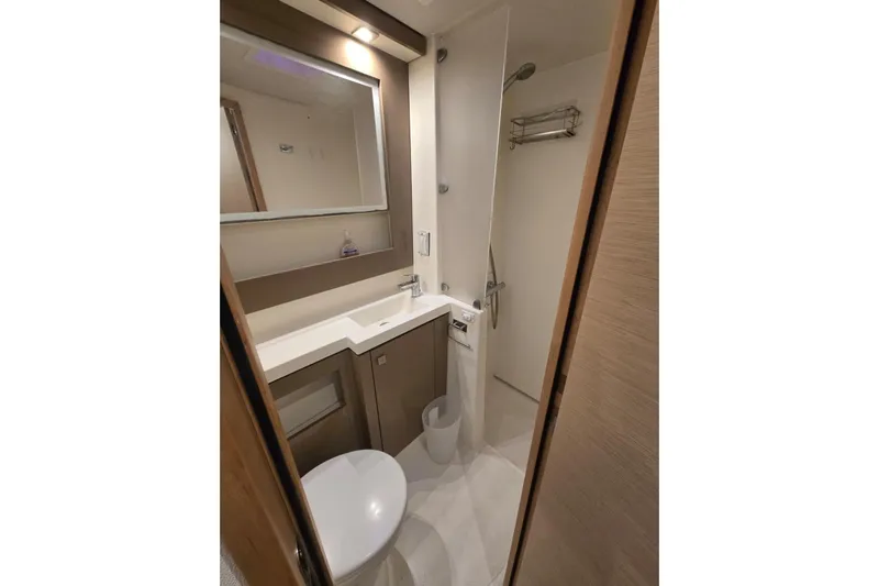 Sol Mates Yacht Photos Pics Modern bathroom in 2018 Fountaine Pajot SABA 50 yacht, featuring sleek design and amenities.